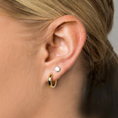 Polished Round Huggie Earrings in Yellow Gold